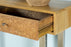 Draco Console Table With Hand Carved Drawers Natural